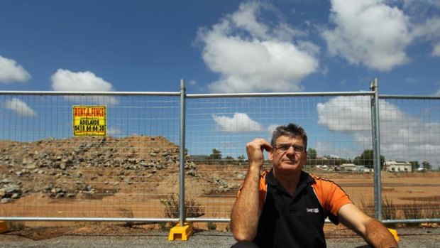 ''You want to see a main street'' ... Broken Hill retailer Peter Nash at the construction site for a new shopping centre, located away from the town's centre.