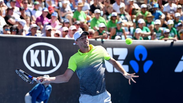 Local hope: John Millman in action during round two of the Australian Open.