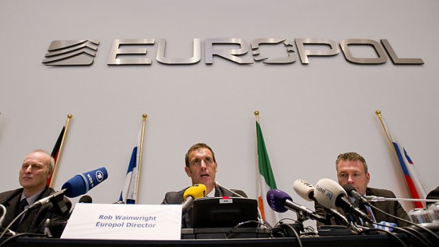 Europol's chief Rob Wainwright, centre, speaks next to Friedhelm Althans, chief investigator of Bochum police (left) and Andreas Bachmann from the Bochum prosecution service during a press conference in The Hague on February 4 after the police smashed a criminal network suspected of fixing 380 football matches, including in the Champions League and World Cup qualifiers.