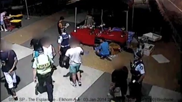CCTV footage showing police with the five Victorian men in Surfers Paradise. Photo: Queensland Police Service.