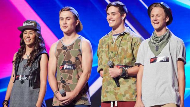 Jayke McGill from Newman (third from left) performs in Straight Up on <em>X Factor</em>.