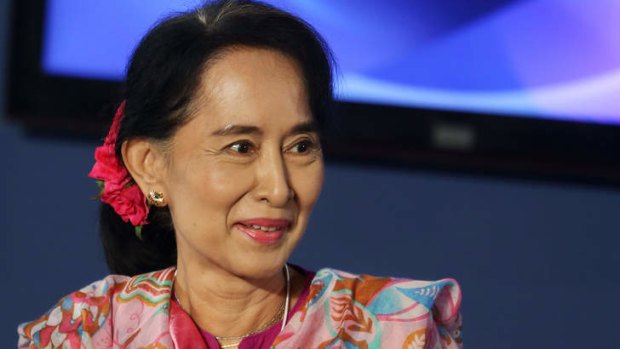 Eyeing the presidency: Aung San Suu Kyi called for a military-drafted law to be amended to allow her to contest elections in 2015.