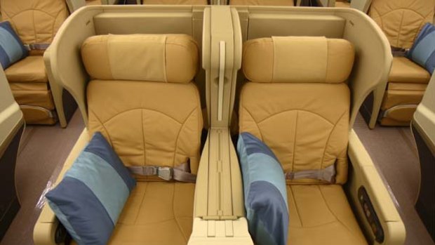 Singapore Airlines business-class seats in a Boeing 777-300A.