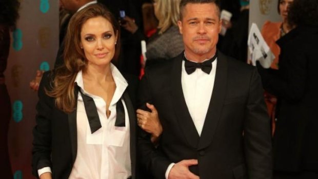 Driving each other 'beautifully crazy': Angelina Jolie and Brad Pitt in February.