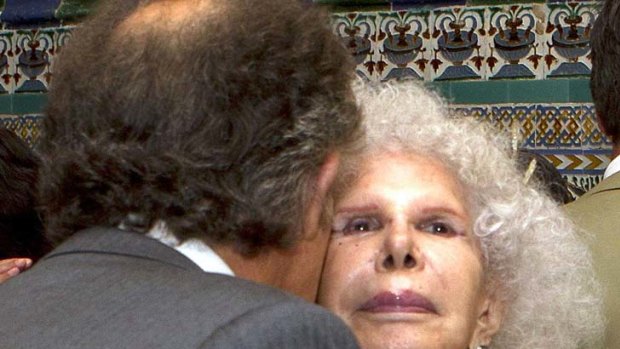 You may kiss the bride ... Alfonso Diez pecks the Duchess of Alba on the cheek.