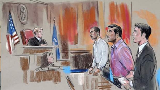 In this artist's drawing Wesam El-Hanafi, center, and Sabirhan Hasanoff are seen with U.S. Attorney John Cronan, during their initial appearance on terrorism related charges at a U.S. District Court on April 30.