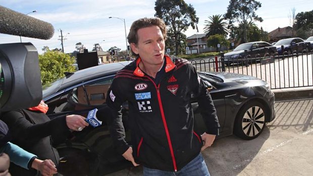 Essendon coach James Hird arrives at Windy Hill Monday morning.