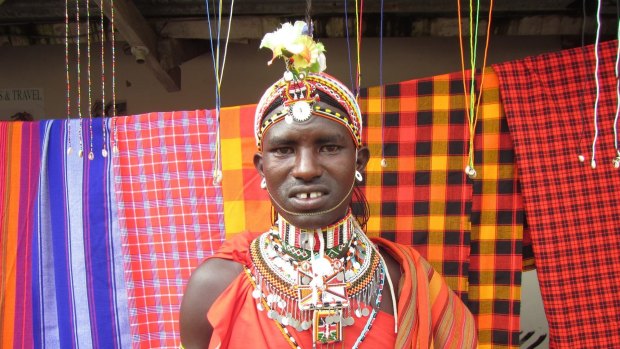 Young Masai man outside a shop in Nairobi.
