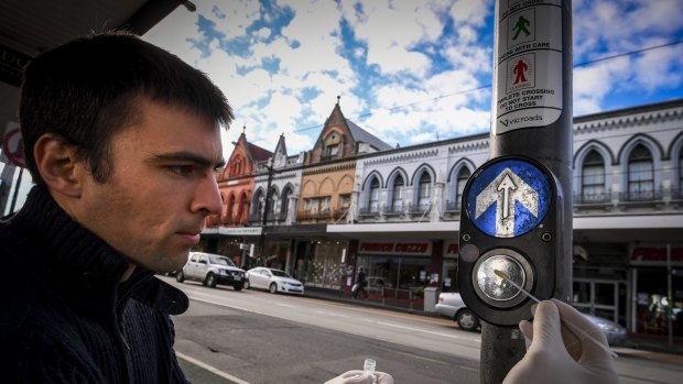 Monash University science undergraduate student Andrew Gray collects samples of bacteria in Brunswick. 