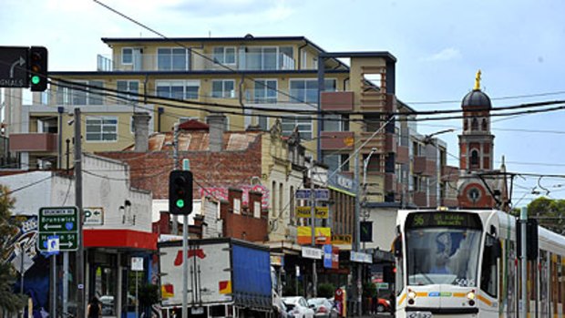 The Baillieu and Gillard governments are at odds on higher density housing plans.