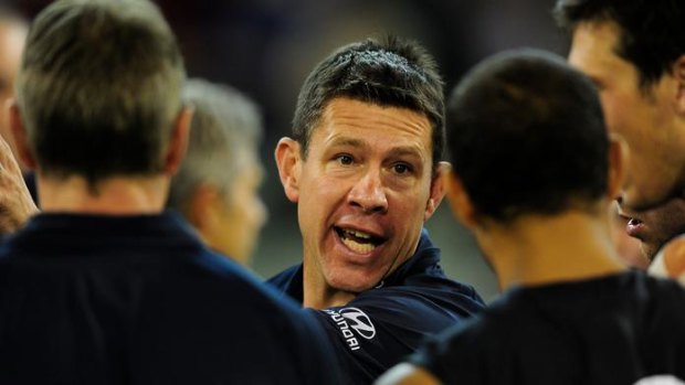 Shoot for the stars: Carlton coach Brett Ratten urges his players on against Collingwood last week.