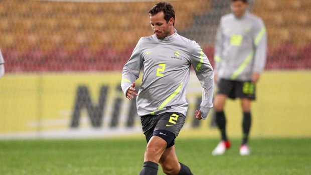 Jarring transition ... Socceroo Lucas Neill says the 20-hour commute from Oman will weigh on his side.