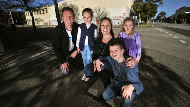 Bernadene and Warren Voss, with children, Lachlan, Eliza and Caitlin at the site for the new school.