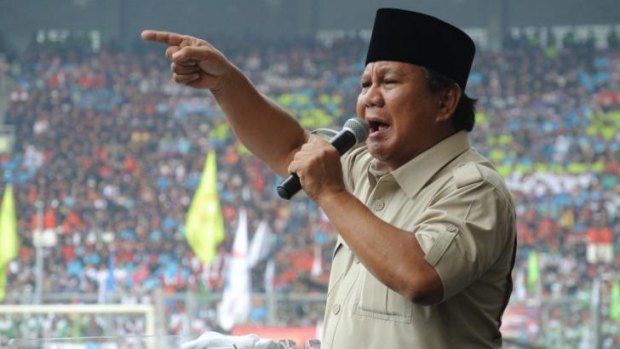 Indonesian presidential candidate Prabowo Subianto addresses a rally of up to 50,000 union members at May Day in the Bung Karno stadium in Jakarta.