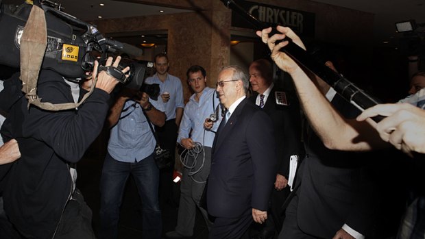 Eddie Obeid arrives at the ICAC hearing flanked by his lawyers, including Stuart Littlemore, on Monday morning.