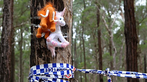 Memorial ... children’s toys near the scene of a bush grave where mourners came to pay respects to Kiesha Abrahams.