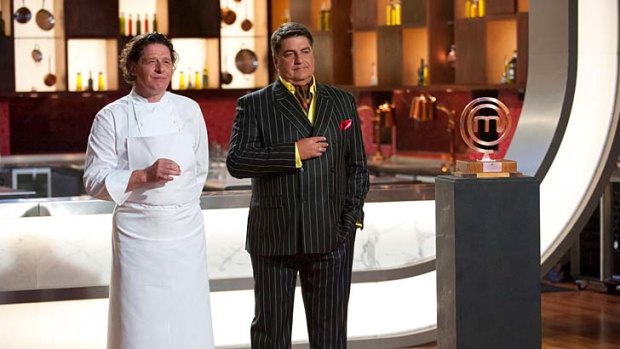 Pierre White and Matt Preston with the <em>Masterchef: The Professionals</em> trophy.