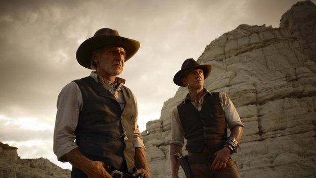 Daniel Craig and Harrison Ford in <i>Cowboys & Aliens</i>.