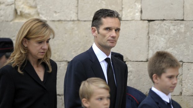 Former Olympic handball player Inaki Urdangarin and his wife, Spain's Princess Cristina, and their family attend the funeral of his father at the Basilica of San Prudencio in Vitoria on May 12, 2012.