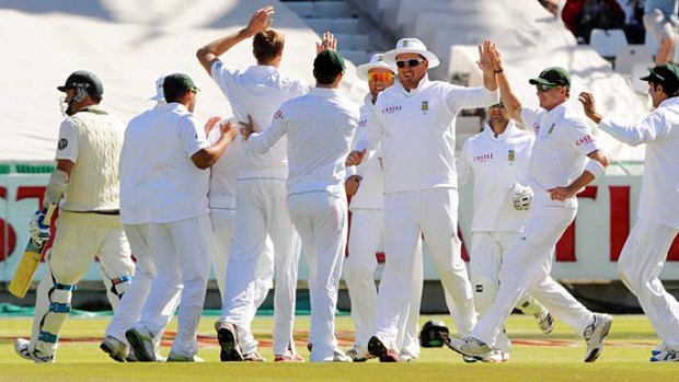 Rout ... South African players celebrate yesterday.