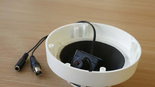 A camera hidden in a fake smoke detector.