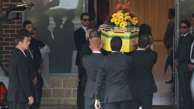 Emotional day: Friends and family mourn their loss at the funeral of Morgan Huxley.