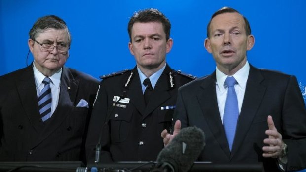 Prime Minister Tony Abbott on Friday, with ASIO Director General David Irvine and AFP Commissioner Andrew Colvin.