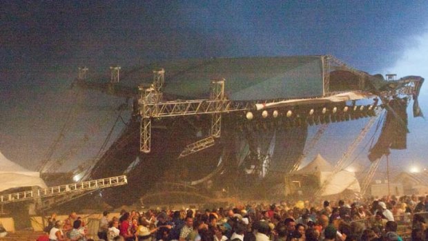 INDIANAPOLIS, IN - AUGUST 13: The stage collapses at the Indiana State Fair August 13, 2011 in Indianapolis, Indiana. The stage fell just before country duo Sugarland were scheduled to perform, killing at least four people and injuring as many as 40 more.  (Photo by Joey Foley/Getty Images)