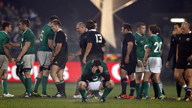 Heartbreak ... the Irish react to the final whistle.
