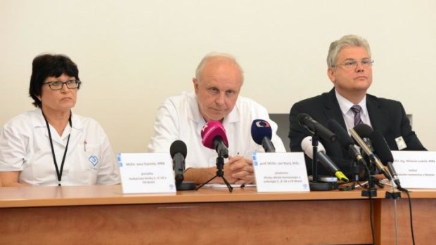 Chairman of Motol hospital Miloslav Ludvik, head of oncology department Jan Stary and head of pediatric department Jana Tejnicka give a press conference at the Prague hospital before the arrival of Ashya King.