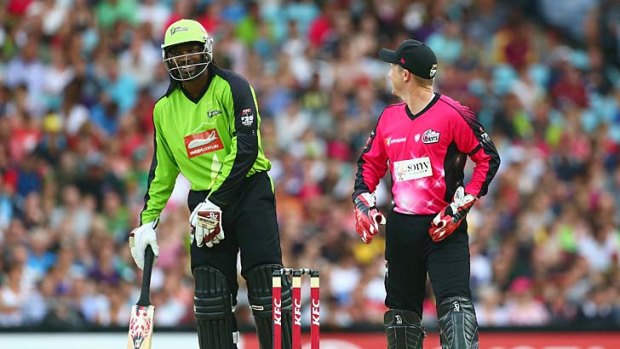 "Just one of those things" ... Chris Gayle and Brad Haddin exchange words.