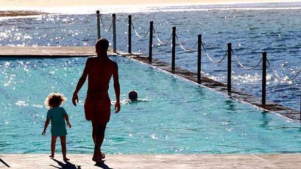 Goodbye, winter?: Swimmers get in the swing of things at Clovelly.