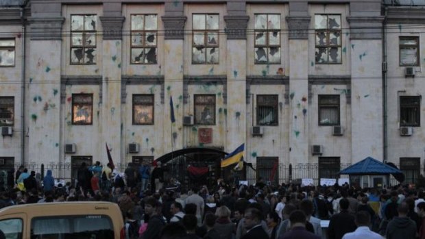 Ukrainian protesters demonstrate outside the Russian Embassy in Kiev.