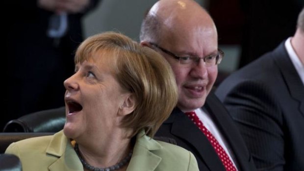 'She eats much more fruit': Angela Merkel at a cabinet meeting in May.