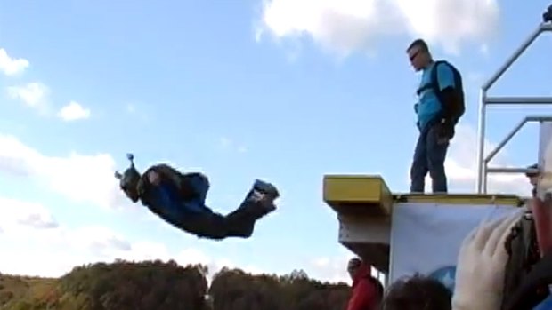 Christopher Brewer leaps from the BASE jumping platform, 270 metres in the air.