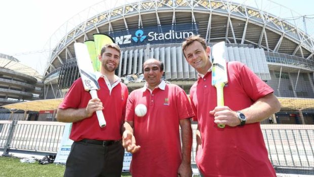 Sporting chance: Ryan Carters, LBW Trust chairman Darshak Mehta and Adam Gilchrist outside Thunder's home ground.