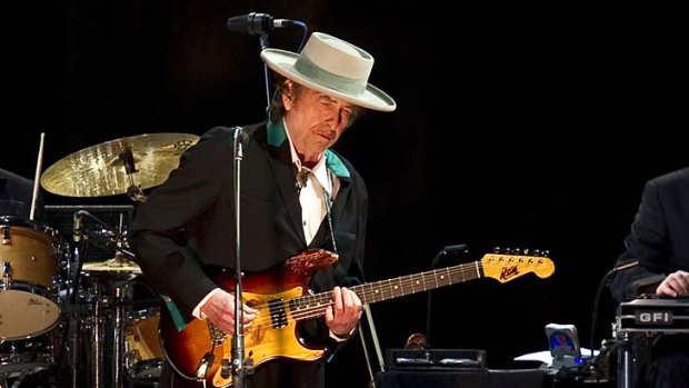 A modern-day Bard ... Dylan — performing in Beijing earlier this month — upholds the vernacular tradition of using ‘‘anything from anywhere, as long as it works’’.