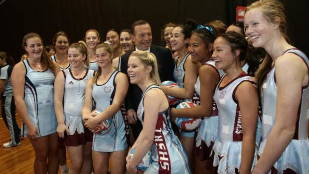 Opposition Leader Tony Abbott at Sydney Olympic Park with netballers.