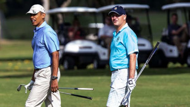 Linked in: Key playing golf with Barack Obama in Hawaii in January.
