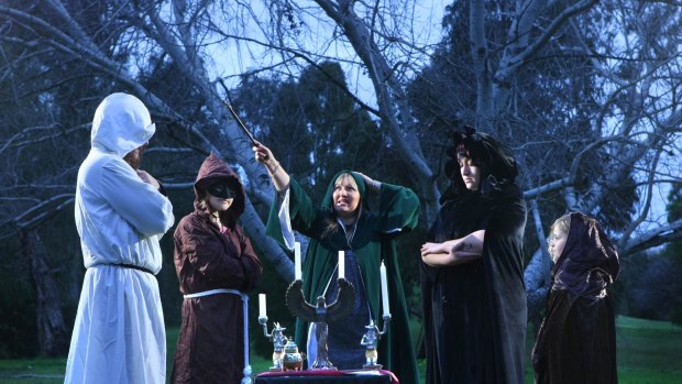 Described as 'Australia's celebrity psychic', Lizzy Rose (centre) claims to be the go-to witch for the rich and famous.