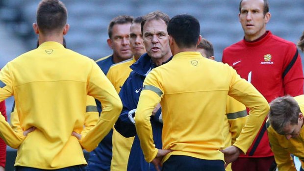 No margin for error: Socceroos coach Holger Osieck speaks to his players.