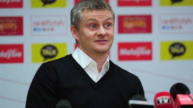 Ole Gunnar Solskjaer faces the press after being unveiled as the new Cardiff City Manager.