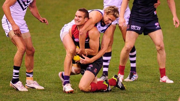 Melbourne's Brad Green battles with Fremantle's Paul Duffield.
