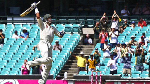 Mike Hussey jumps for joy upon reaching his matchwinning century at the SCG yesterday against Pakistan.
