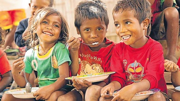 Eager faces: World Vision says about 300 Australians a year travel to meet their sponsor children.