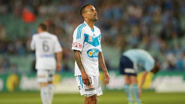 Melbourne Victory's Archie Thompson shows his disappointment after his team's loss.