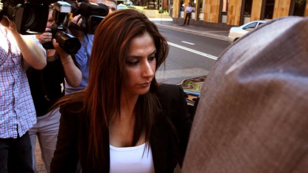 Mick Hawi's wife, Carolina Gonzales, leaves Parramatta court after the verdict.