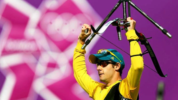 Taylor Worth of Australia celebrates his round of 16 victory over world number one Brady Ellison in the London Olympics archery tournament at Lord's.