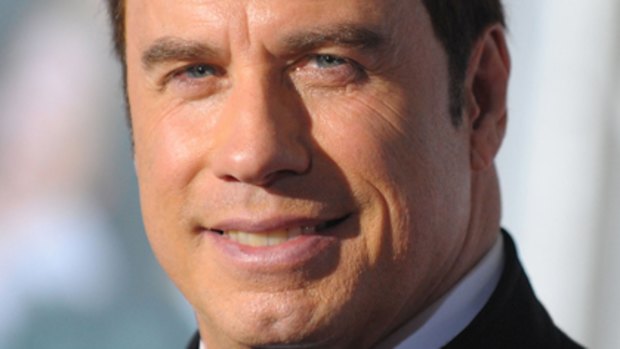 Condolences ... John Travolta loses pet dogs in airport accident.