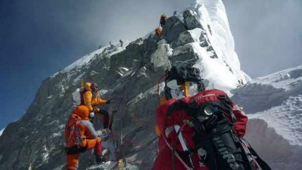 Despite overcrowding on the mountain, Nepal will slash climbing fees for Everest and other Himalayan peaks to attract more mountaineers.